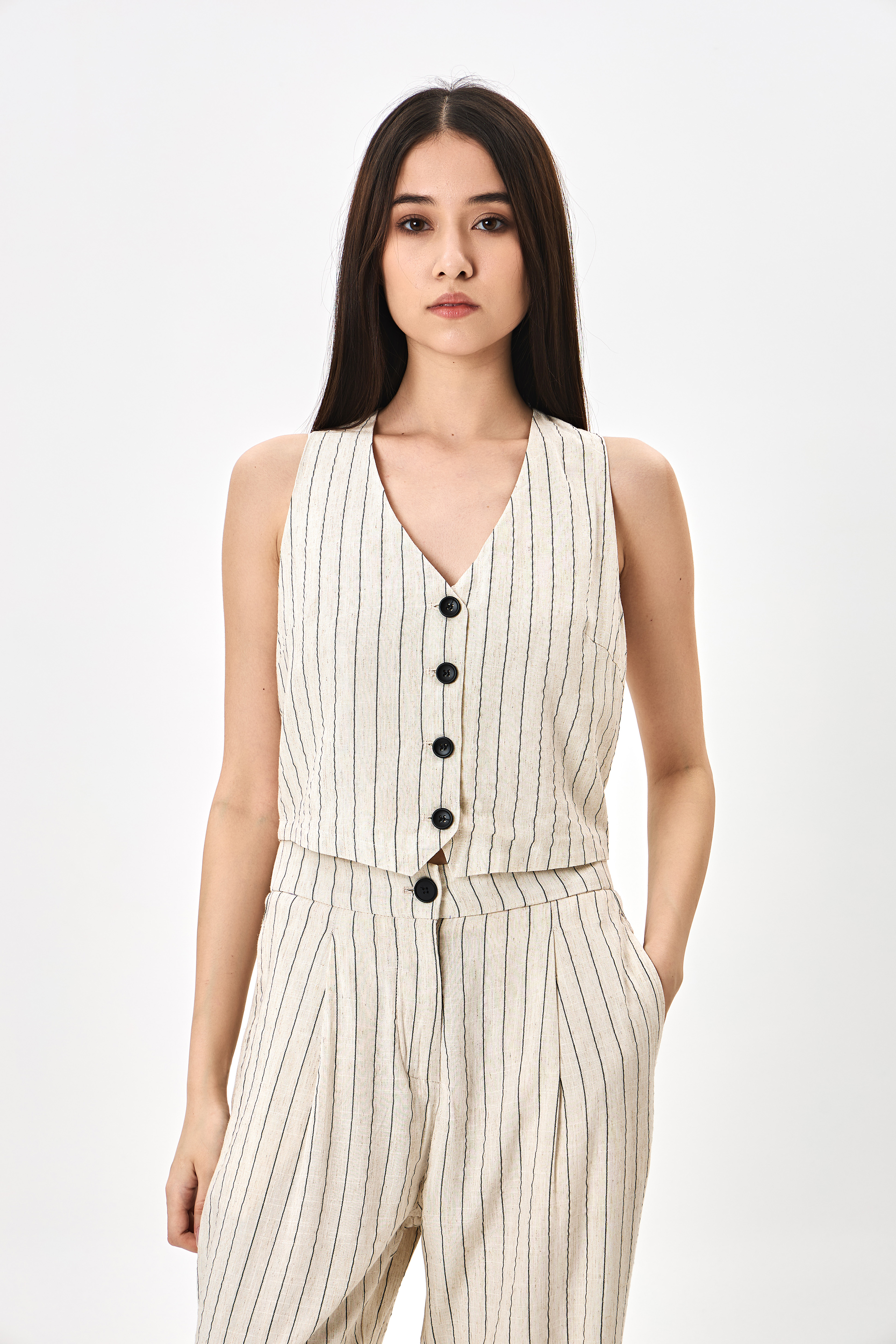 Женская жилетка